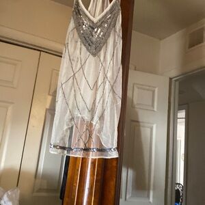 Small see through blouse embellished silver overtones